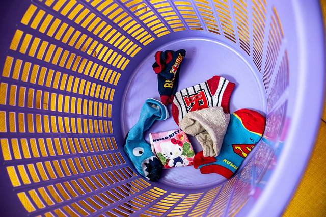 Child can help by matching socks in the laundry basket.